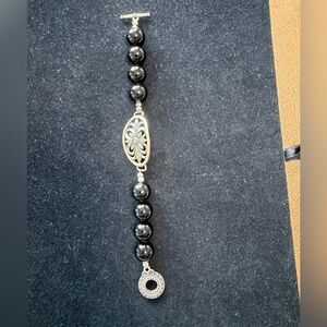 Elegant Black Onyx Beaded Bracelet with 925 Sterling Silver Floral design plate